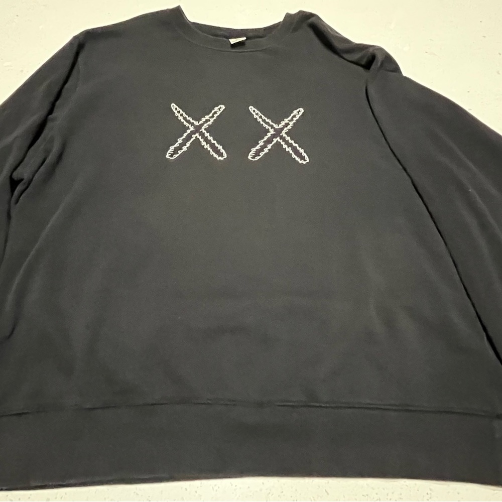 Men’s Kaws crewneck sweatshirt with Sesame Street characters on back